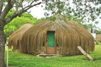 Nhambavale Lodge Отели в г. 