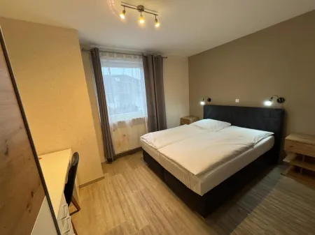 Hotel Zum Weinberg Отели в г. Кёнигслуттер-ам-Эльм