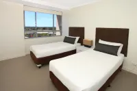 Signature Waterfront Apartments Hôtels à : Mudgeeraba
