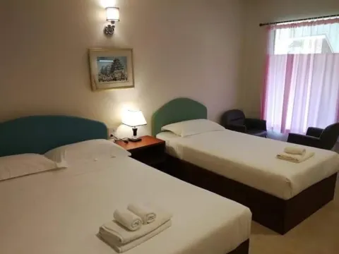 ห้องพักสำหรับสามท่านพร้อมวิวสระว่ายน้ำ