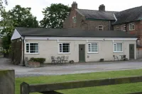 The Manor Guest House فنادق في Linton-on-Ouse