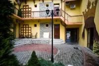 Curtea Brasoveana Hotels near "The First Romanian School" Museum