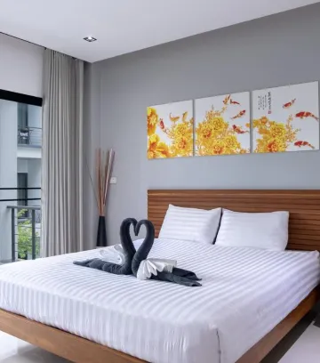 ห้องดีลักซ์ เตียงใหญ่ 1 เตียง