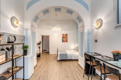 The Quarters Naples Apartments Отели в г. 