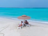 Pavona Maldives - en bord de mer