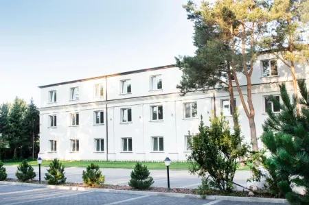 Klub Sosnowy Отели в г. Юзефув