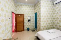Homestay Rand's Kopi Pandan Syariah Mitra RedDoorz Hotel dekat Vie Cafe & Ferboden Distro