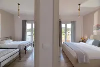 Stork Holiday Apartments - Garden & Sea View Hotels in Vivari