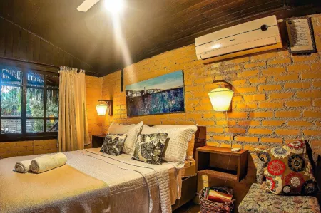 Pousada Rosa da Praia - Praia do Rosa - SC Отели рядом с достопримечательностью «Ponta da Piteira»