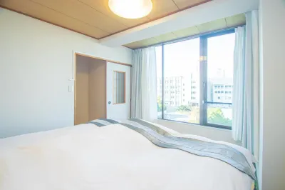 Amp Flat Nishijin 5 Hotel di Sawara Ward