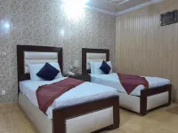 Hotel Tulip Inn Faisal Town Hotels near Panjab university employees housing scheme town II park