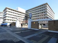 Guesthouse Hyakumanben Cross - Hostels