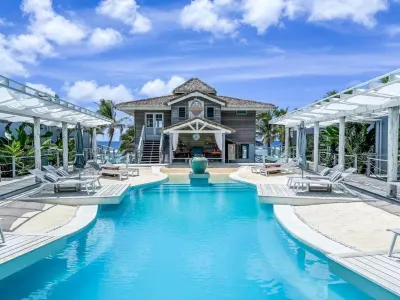 Ocean Escape Resort & Spa Hotels near Over-Water Night Show & Dinner