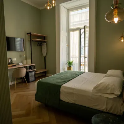 Boutique Luxury Suite Отели рядом с достопримечательностью «Концертный зал «Напулитаната»»