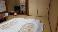 Tsukimotoya Ryokan Отели в г. Тоёока