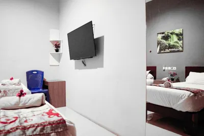 Audah Syariah Residence Mitra RedDoorz Hoteller i Sawunggaling