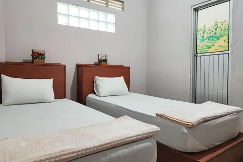 RedDoorz Syariah Near Tugu Macan Kayu Aro