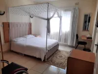 Home up Guest Apartments and Lodge