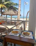 The African Paradise Beach Hotel - de playa