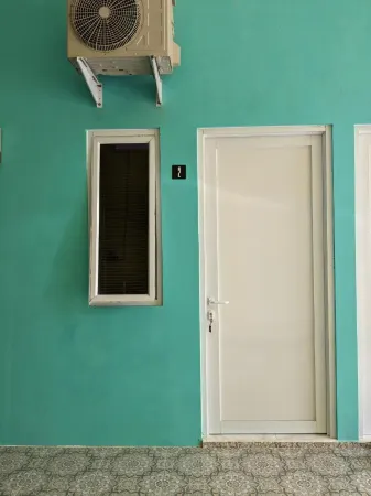 Bertamu Penginapan Syariah Отели в г. West Air Tawar