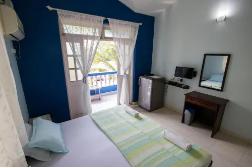 Veeniola Holiday Home فنادق في Orlim