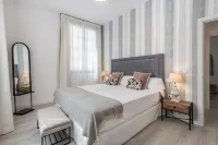Apartamentos Puerta Elvira Suites 3000