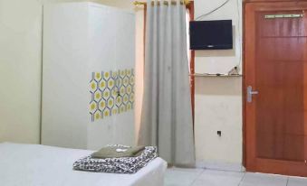 Pakansari Guest Inn Mitra RedDoorz