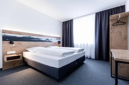 Stadthotel Freilassing Отели рядом с достопримечательностью «Lokwelt Freilassing»