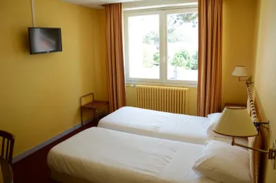 Logis le Petit Trianon Hotels near World biggest snake skeleton