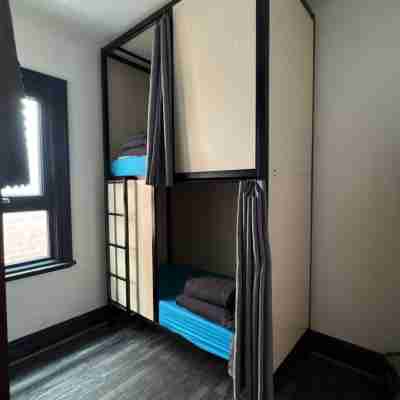 Haus Accommodation - Note - Valid Passport Required to Check-IN Rooms