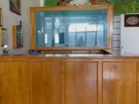 Hotel Lucky 21 Syariah Mitra RedDoorz Hotels in Batu Urip Taba