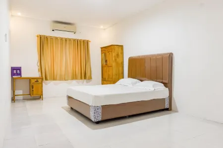 Hotel O Enjoy Homestay & Cafe Отели в г. Somba Opu