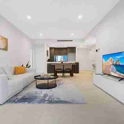 Modern 2BR with City Views & Pool Near Parramatta Others