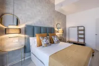 Apartamentos Puerta Elvira Suites 3000