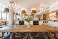 โรงแรมสแตรนด์ ฮึบเนอร์