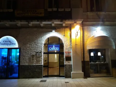 Cairoli Exclusive Rooms & Suite Отели рядом с достопримечательностью «Colonne Terminali della Via Appia»