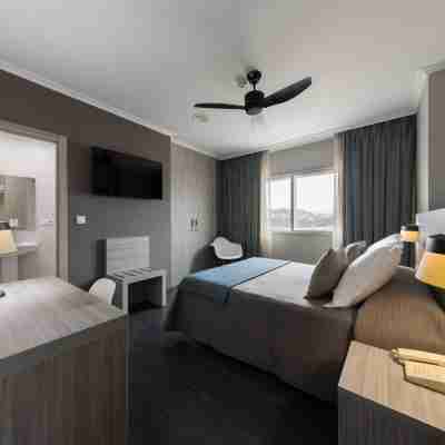 HOTEL COMBARRO Rooms