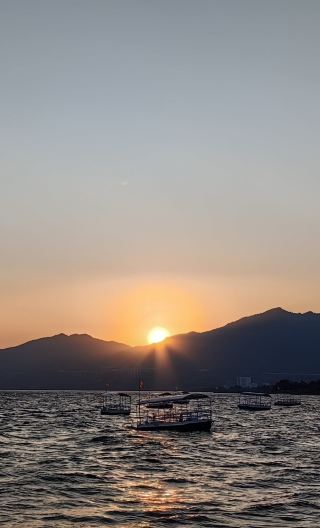 Fuxian Lake Group Day Tour in Kunming:Enjoy A Calm Pedal Boat Ride on China's Deepest Lake