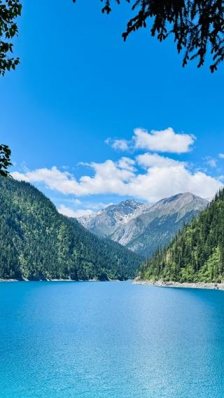 Huanglong Valley & Jiuzhaigou Private Tour by High-speed Train from Chengdu