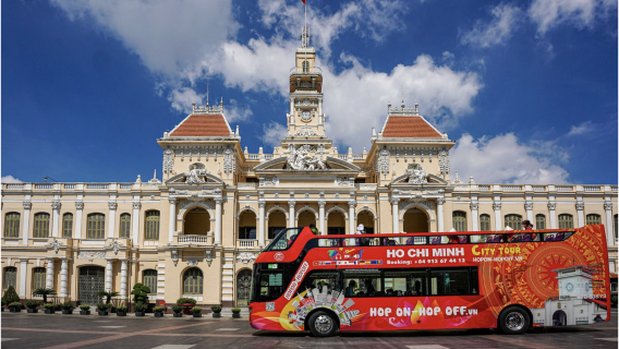 Discover The Charm of Ho Chi Minh at Night: Water Puppet Show/DD Bus & Dinner Cruise