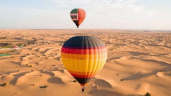 Vuelo en globo aerostático en Dubái para ver el amanecer, excursión al amanecer en el desierto, traslado al hotel opcional incluye comidas/paseo en camello/cetrería/ATV y montar en las dunas