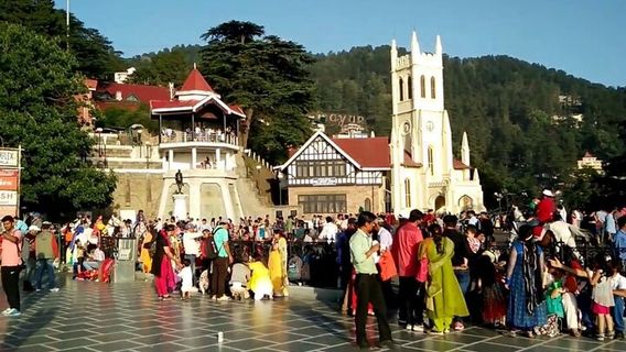 Groups of ladies walking on the streets of Shimla wearing the traditional  Himachal dress. Shimla is the capital city of the Indian state of Himachal  Pradesh, located in northern India at an