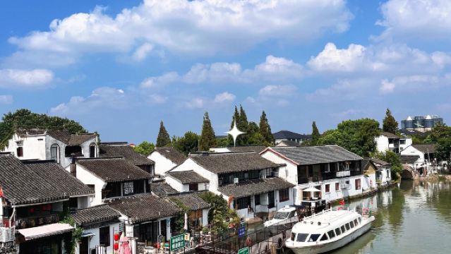 Shanghai English Guided 1-Day Tour - City God Temple, Yu Garden, Zhujiajiao, The Bund with Tickets, English Guide, and Bus