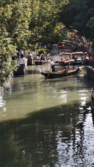 Multilingual optional Shanghai Zhujiajiao ancient town + Qingpu Outlet relaxing 1-day tour