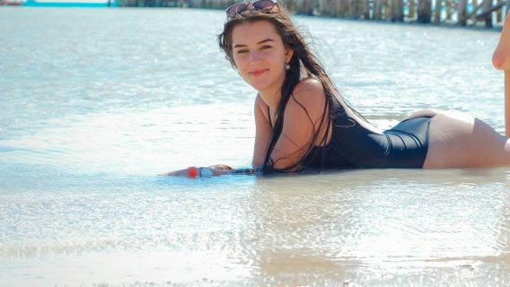 Orange Bay: Geführte Bootstour + Schnorcheln & Wassersport + Transfer + Mittagessen