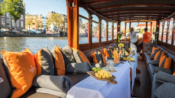 Amsterdam Luxury Canal Cruise: Departing from Anne Frank House (Including Unlimited Cheese & Wine, Expert Commentary, and All-Weather Comfort)