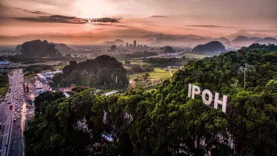Passeio de um dia privativo com traslado em carro particular de Kuala Lumpur para Ipo: história + gastronomia