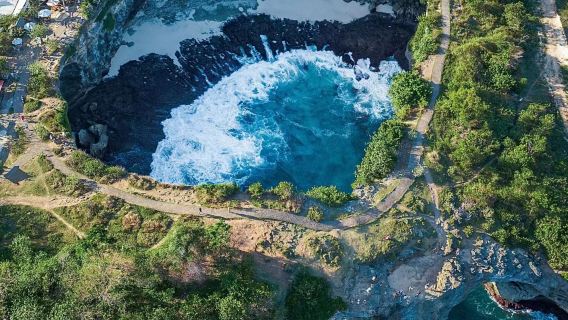 1-day tour to Bali with round-trip to Nusa Penida West Line, shore snorkeling, banana boat, and donut ride