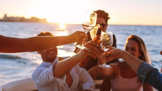 Rhodes: Sunset Cruise with Open Bar, Dinner, & Live Music