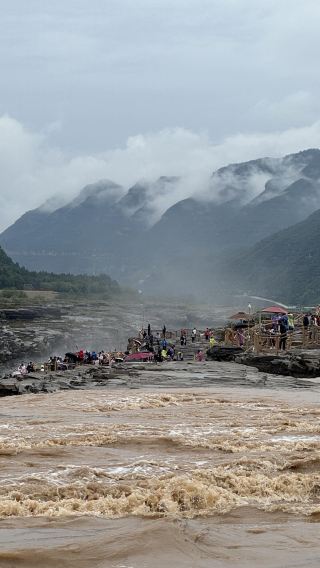1-day tour to The Mausoleum of Yellow Emperor, Hukou Waterfall of Yellow River, and Nanniwan in Yan'an, Shaanxi with bilingual service (admission tickets not included)
